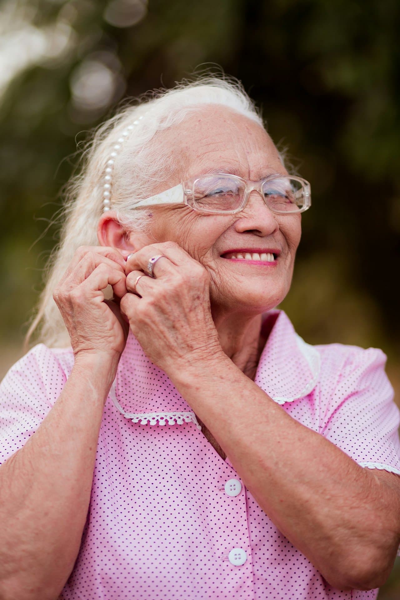 Smiling senior woman enjoying time outdoors
